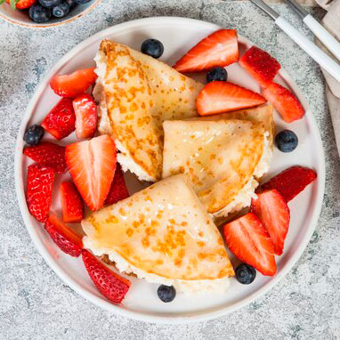Thin crepes with ricotta cheese fresh strawberries gray concrete background 186456 446